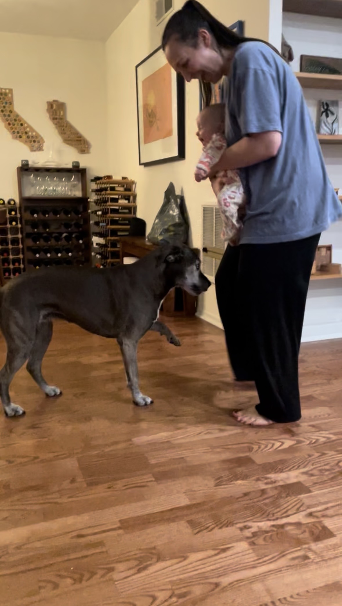 Rae meeting Nora as a baby
